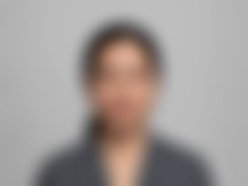 Candidate photo, hidden until verified