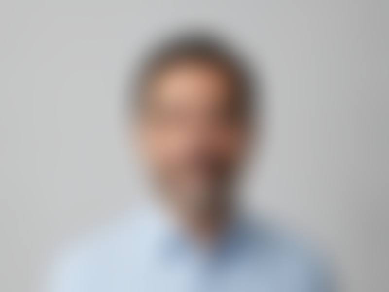 Candidate photo, hidden until verified