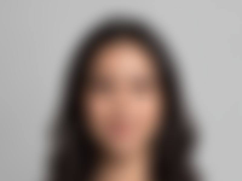 Candidate photo, hidden until verified
