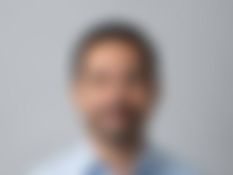 Candidate photo, hidden until verified